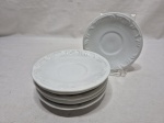 Jogo de 6 pires de chá em porcelana branca trabalhada com relevos. Medindo 14,5cm de diâmetro.