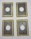 BRONZE - Lote de 4 espelhos para tomadas redondas. Med. 12x9 cm. Marcas de uso.