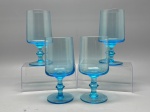 DEMI CRISTAL - Conjunto de 4 taças em demi cristal em tom azul. Alt. 15 cm.