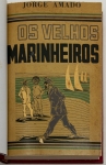 Livro: AMADO, Jorge. `Os Velhos Marinheiros`, Duas histórias do cais da Bahia, 1ª edição (3ª tiragem). São Paulo: Martins, 1961; 322p. + catálogo das traduções de Jorge Amado. Enc. conservando as capas.