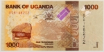 Numismática, Uganda. 1000 shillings. Flor. 