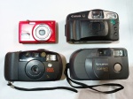Lote contendo quatro antigas câmeras fotográficas. Nikon Coolpix, Canon LX, Kodak Star 1035Z e Fujifilm Clear Shot Plus. Para conserto ou retirada de peças.