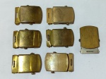 LOTE CONTENDO 7 FIVELAS DE CINTO MILITAR. DUAS SICILIANO, UMA USA E AS RESTANTES SEM MARCA APARENTE.