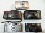Lote contendo cinco antigas câmeras fotográficas. Canon Prima BF-800, Kodak Star 635, Fuji DL-25N, Pentax 70XL e Samsung AF 480R. Para conserto ou retirada de peças.