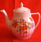 BULE DE CHÁ EM PORCELANA POZZANI. ALTURA TOTAL APROXIMADA 16 CM.