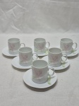 Jogo de 6 xícaras de café e  pires em porcelana Renner Medaillon floral. Medindo 5cm x 5,5cm de altura.