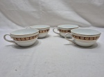 Jogo de 4 xícaras de chá sem pires em porcelana Schmidt barra vinho com ouro. Medindo 9,5cm x 5,5cm de altura.