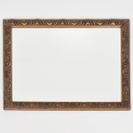 ESPELHO, um (1) retangular em cristal bisotado, moldura em madeira com douração, medindo 57,5 x 47 cm, sinais de uso, vide foto.