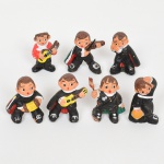 ESCULTURAS, sete (7) figurativas representando músicos, confeccionadas em cerâmica, policromadas, medindo em média 4,5 cm altura, vide foto.