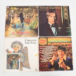 MÚSICA, quatro (4) LPs em vinil: Fischer Chore; Conserto Saint-Preux; Richard Clayderman; Valsas de Strauss, todos aparentemente em bom estado, usados e sem garantia, vide foto.