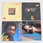 MÚSICA, quatro (4) LPs em vinil: Bob Fleming; Arrow; Gipsy Kings; Paul Simon, todos aparentemente em bom estado, usados e sem garantia, vide foto.