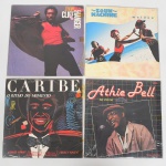 MÚSICA, quatro (4) LPs em vinil: Caribe  O Ritmo do Momento; Athie Bell  Ao Vivo; Zouk Machine; Jimmy Cliff, todos aparentemente em bom estado, usados e sem garantia, vide foto.