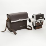 CINEMA, uma (1) filmadora da marca BELL & HOWELL, modelo AUTOLOAD 309, acondicionada na caixa original, usada, não testada e sem garantia, vide foto.