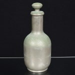 DIVERSOS, uma (1) garrafa térmica, AMERICAN THERMO BOTTLE Co., confeccionada em metal prateado, sinais de azinhavre, interior em vidro, tampa com vedação em cortiça, usada, vide foto.