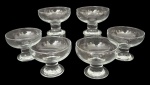 Conjunto com 6 taças para sobremesa em demi-cristal incolor, corpo em formato de coupe com haste curta e base circular. Peças próprias para sorvete ou sobremesa. Mede 9cm x 11cm.
