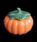 Grande molheira em porcelana na forma de moranga com tampa. Medida 14x12cm. Capacidade de 600ml.