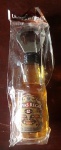 COLECIONISMO - Mini garrafa de Whiski Chivas Regal em formato de abridor. Alt. 12,5cm.