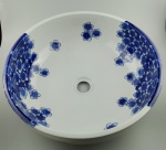 Belissima Cuba em porcelana oriental com decoração de flores  . Medindo 40 cm de diâmetro x 15 cm de altura.