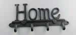 Aplique para parede com frase " Home " em ferro fundido, com quatro ganhos . Medindo 30 x 15  cm.