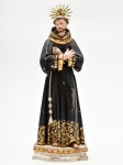 Raríssima Imagem de São Francisco de Assis, em madeira policromada e dourada, olhos de vidro, medindo 41 cm de altura. Acompanha Resplendor de prata vermeil. Brasil séc. XIX.