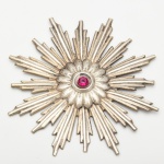 Antigos Resplendor de em prata Brasileira, em forma de raios, medindo 10 cm de diâmetro. Séc. XIX.