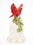 Antiga Sineta de Mesa em porcelana, marcada, pega em forma de Cacatua, nas cores branca e vermelha, medindo 14 cm de altura.