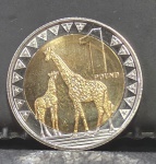 FLOR DE CUNHO uma moeda de 1 libra do Sudão do Sul, emitida em 2015, apresentando girafas núbias no