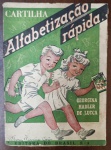 Cartilha Antiga "Alfabetização Rápida"  Georgina Hadler de Lucca  Editora do Brasil S/A - Raro exemplar da histórica Cartilha Alfabetização Rápida, escrita pela educadora Georgina Hadler de Lucca. Publicada pela prestigiada Editora do Brasil S/A, esta cartilha foi um dos pilares do ensino primário brasileiro em meados do século XX.