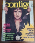 Revista Contigo! Nº 82 (Jan/1970) - Roberto Carlos na Capa - Jovem Guarda - Oportunidade excepcional para colecionadores de memorabilia do Rei Roberto Carlos e entusiastas da música brasileira. Este exemplar original de janeiro de 1970 celebra os 20 anos da Editora Abril e captura a essência da cultura pop no início da década de 70.