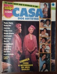 Revista Amiga Especial - Casa dos Artistas - Ed. Bloch (Anos 70) - Regina Duarte - Este exemplar original da Amiga Especial apresenta uma cobertura luxuosa das residências e da intimidade de grandes estrelas. A capa destaca a "Namoradinha do Brasil", Regina Duarte, em um elegante traje rosa de época.