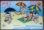 Cartão Postal Nestlé / Turma da Mônica (1995)  Cena 1 L "Turma na Praia" Cartões Postais promocionais Nestlé / Turma da Mônica (1995). A cena retrata a turma na praia, com o Cascão fiel ao seu estilo, protegido sob um guarda-chuva.