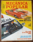 RARIDADE 1969 Revista Mecânica Popular - Especial Polícia e Tecnologia VASCARAtenção Corredores: Cuidado com o VASCAR"  Reportagem sobre o novo dispositivo de medição de velocidade usado pela polícia, ilustrada por um Plymouth Barracuda sendo perseguido por uma viatura.