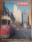 HISTÓRICA 1954 Revista O Mundo Ilustrado Nº 52 - Especial IV Centenário de SPFoto colorizada clássica da Avenida São João, destacando o trânsito da época com um ônibus antigo e os imponentes edifícios do centro, como o Martinelli e o Altino Arantes (Banespa).