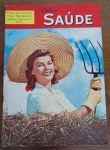 RARIDADE 1967 Revista Vida e Saúde Nº 1 - Edição VintageIlustração colorida clássica da década de 60, apresentando uma temática bucólica com uma moça de chapéu de palha e forcado, simbolizando a vida saudável no campo.