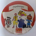 PEQUE VINCO CONFORME FOTO: ITEM DE COLECIONADOR Flexi-disc McDonald's Papaburger (1982)  Raridade NostálgicaRaro disquinho promocional do McDonald's, modelo "Flexi-disc" (folha sonora), um item clássico da memorabília brasileira dos anos 80. Este exemplar contém a faixa "Papaburger", trazendo as vozes dos personagens icônicos da Turma do Ronald McDonald.