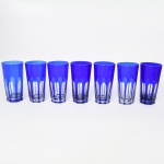 Seis (06) Copos em cristal francês para long drink double azul, base oitavada, lapidação a mão padrão dedão, aresta vertical. Med. 14 x 7,5 cm.