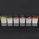 CRISTAL - seis(6) copos para whisky em cristal alemão, ainda contendo etiqueta, sem uso com a parte de baixo em cristal bico de jaca. Com tonalidade diversas. MEd. 9,5 x 8cm.