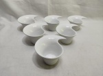 Jogo de 6 diferentes xícaras de café em porcelana branca. Medindo 9cm x 6,5cm de altura.
