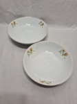 Jogo de 2 travessas redondas fundas em porcelana Steatita floral com friso ouro. Medindo 24,5cm x 6cm de altura.