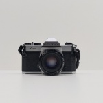 Câmera Fotográfica, Marca Pentak, Modelo K 1000, Com a Capa, Não testado o funcionamento. Medidas com a Capa: Altura: 10 cm, Largura: 10,5 cm, Comprimento: 15,5 cm, Peso: 820 g.