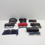 Lote com 8 Óculos de Sol, 1 Optoline, 1 Vinitz, 1 Polaroid, 1 Kaleido, 1 Gucci ( Necessita Conserto na Perna do Óculos),  3 Sem identificação, Com Detalhes pelo Uso, Todos na Caixa. Medidas do Maior: Altura: 7 cm, Largura: 8 cm, Comprimento: 17,5 cm, Peso Total: 620 g.  