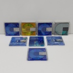 Lote com 8 Mini Disc, 5  da Marca TDK,  3 AXIA, Não testado o Funcionamento de Nenhum. Medidas do Lote: Altura: 6,5 cm, Largura: 7 cm, Comprimento: 8 cm, Peso Total: 270 g.