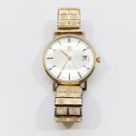 Relógio de Pulso, Tissot, Pulseira em Metal, Com Detalhes pelo Uso. Medidas: Altura: 1,5 cm, Largura: 3,5 cm, Comprimento: 9,5 cm, Peso: 50 g.