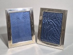 2 Porta retratos em Prata 900. Peso líquido: 257 gramas. Med.  21 x 15 cm.