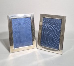 2 Porta retratos em Prata 900. (Temos mais dois idênticos no lote ......). Peso líquido: 252 gramas. Med.  21 x 15 cm.