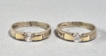Dois aneis em prata, detalhes em ouro e zircônias. Aro 20