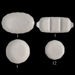 Conjunto de peças para jantar em porcelana monocromativo branco, modelo Butterfly Flower, com acabamento em alto relevo floral e borboletas. Constando de 15 peças, sendo: 1 saladeira (4 x 22 cm), 1 travessa oval (31 x 20 cm), 1 petisqueira (34 x 15 cm) e 12 pratos (19 cm).