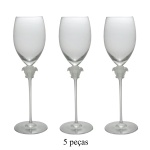 ROSENTHAL Design da MAISON VERSACE. Modelo Medusa Lumiére  Conjunto de 5 flutes em cristal transparente com motivo de cabeça de Medusa em alto relevo. Peças assinadas e sem uso. 26 cm.