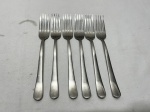 Jogo de 6 garfos de mesa em aço inox Wolff. Medindo 20,5cm de comprimento.