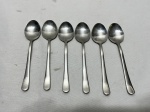 Jogo de 6 colheres de chá em aço inox Wolff. Medindo 13,5cm de comprimento.